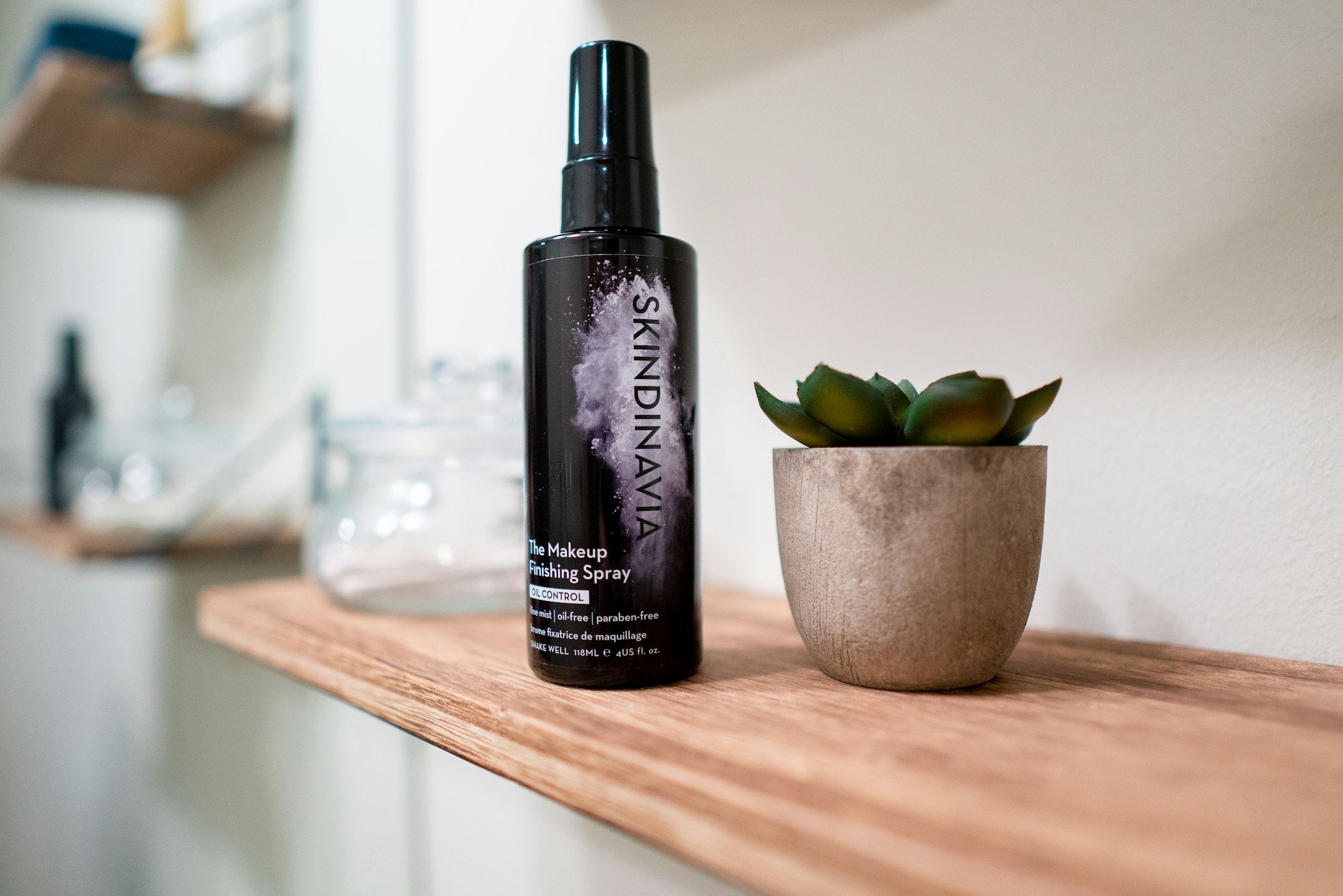 Decorated cosmetic spray bottle